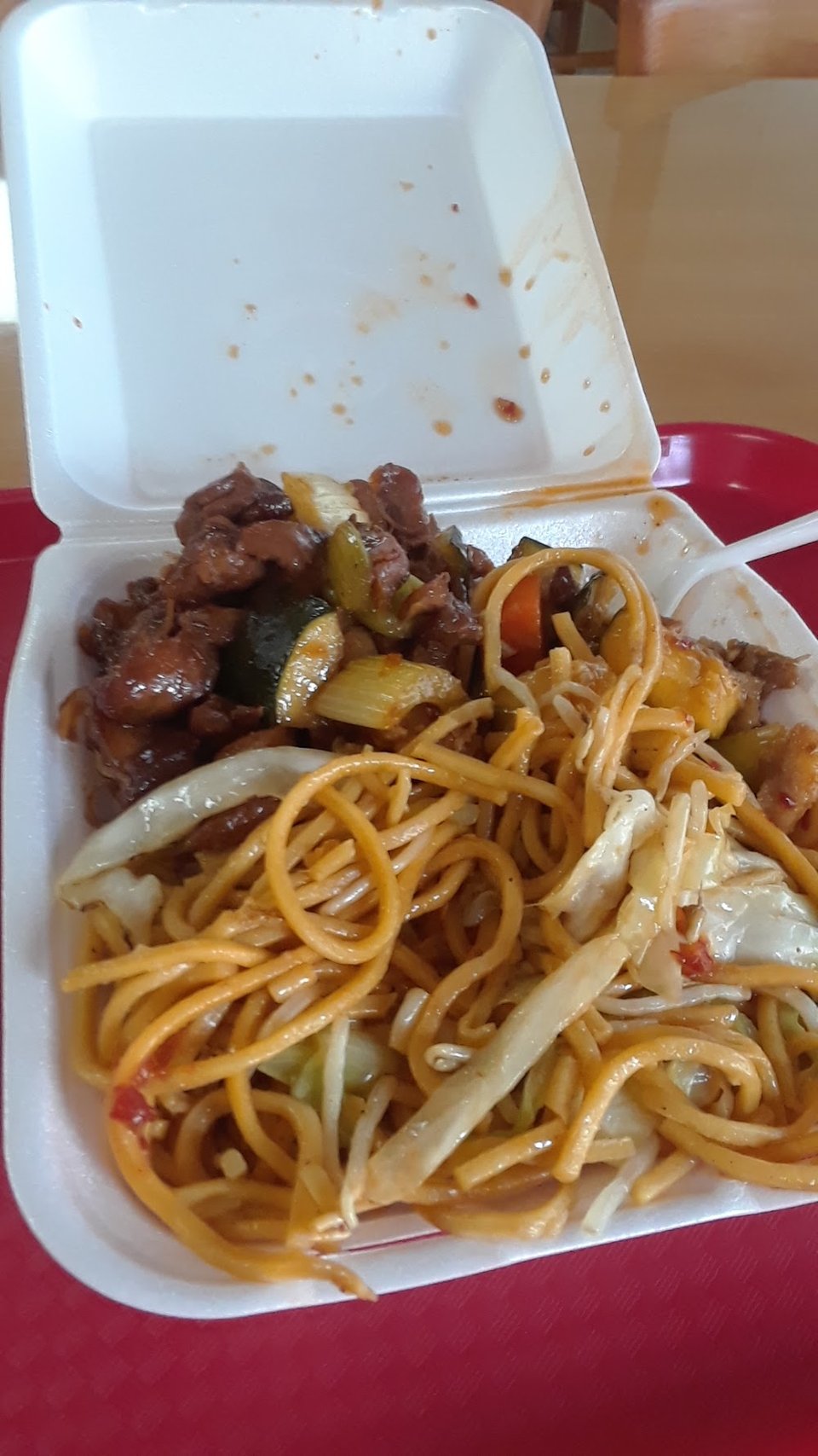 Menu board with Chinese fast food choices.