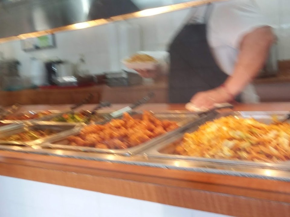 Printed menu showing chow mein and fried rice.
