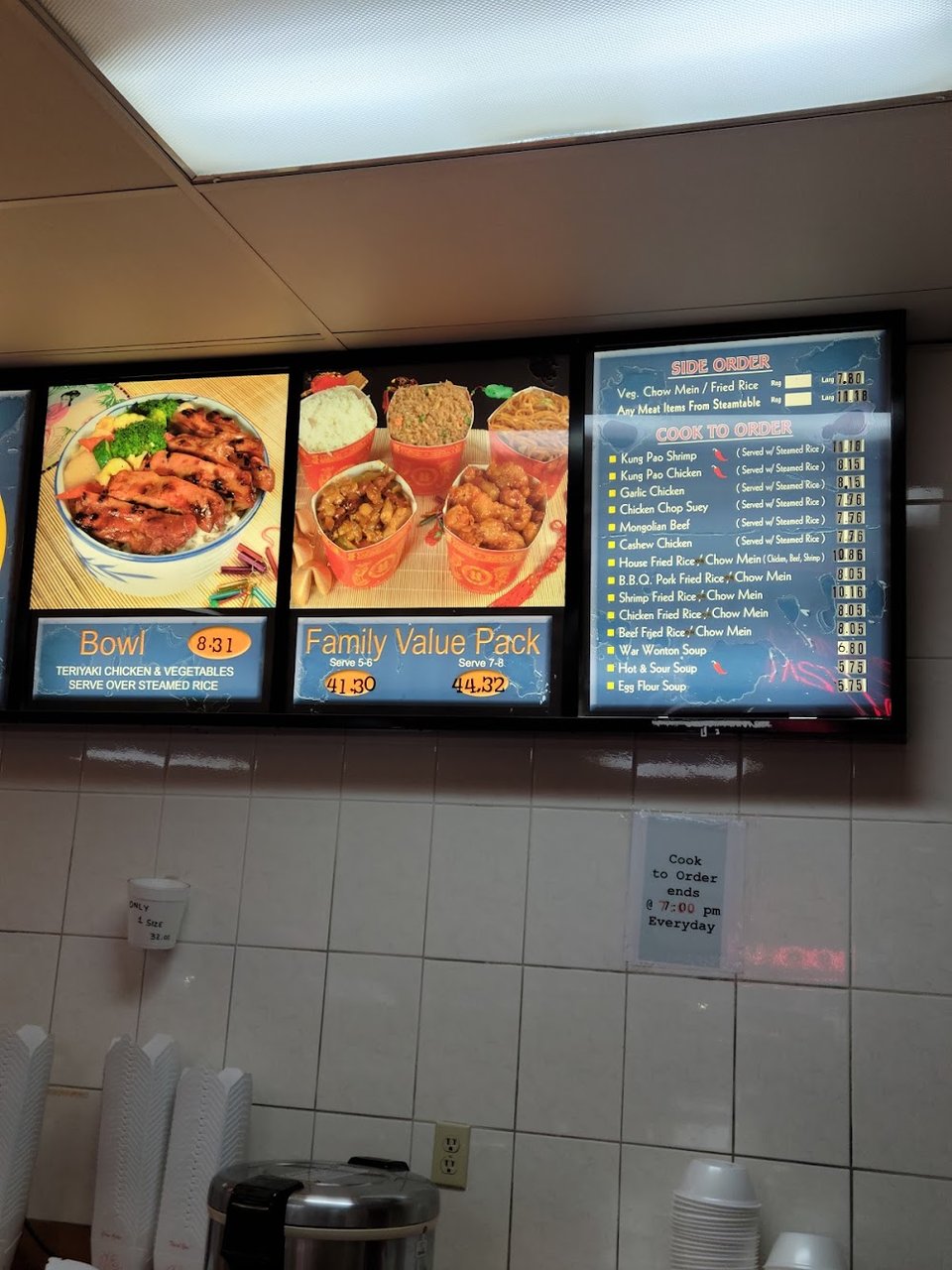 Menu board with Chinese fast food choices.